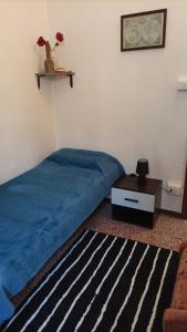 Ένα ή περισσότερα κρεβάτια σε δωμάτιο στο Del Borgo Rooms - Self Checkin H24