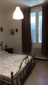 Ένα ή περισσότερα κρεβάτια σε δωμάτιο στο Del Borgo Rooms - Self Checkin H24