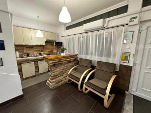Kuchyňa alebo kuchynka v ubytovaní Central Apartman Makó