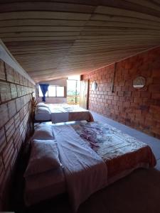 Postel nebo postele na pokoji v ubytování Eco Hotel Manu Viajeros