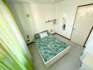 a small bedroom with a bed in a room at Lisbon at your Doorstep - Bedrooms in Lisbon
