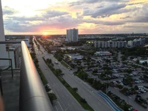 an aerial view of a city with a highway and buildings at Lovely 1 Bedroom & 1 Bath Kitchen Balcony 18 Floor in Hallandale Beach
