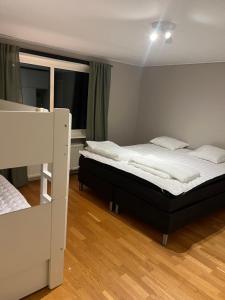 Postel nebo postele na pokoji v ubytování Villa på landet i Kulltorp