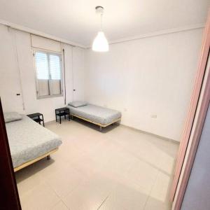 Vuode tai vuoteita majoituspaikassa Apartamento Valencia capital 5