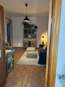 Ένα ή περισσότερα κρεβάτια σε δωμάτιο στο Casa Costura