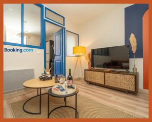 Μια τηλεόραση ή/και κέντρο ψυχαγωγίας στο L'Aparté T2 Relax & Cosy en Toscane occitane-Gaillac hypercentre