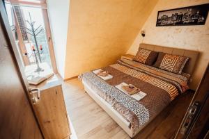 Giường trong phòng chung tại Apartman Petar 26