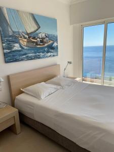 Ένα ή περισσότερα κρεβάτια σε δωμάτιο στο Villa Eze Vue Mer