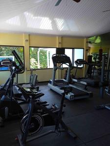a gym with several exercise bikes in a room at Hostal Casa Las Lajas in Las Lajas