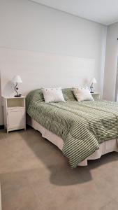 Postel nebo postele na pokoji v ubytování Departamento Sol de Mayo - Godoy Cruz