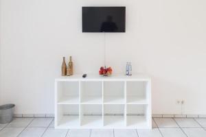 TV a/nebo společenská místnost v ubytování Apart Hannover Monteurzimmer