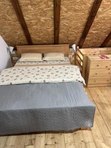 Letto o letti in una camera di Apartmani Milekić
