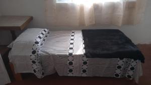 מיטה או מיטות בחדר ב-Pousada Inaya