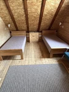 Letto o letti in una camera di Apartmani Milekić