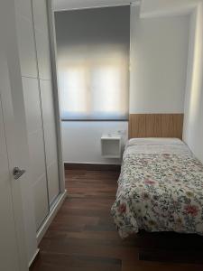 Postel nebo postele na pokoji v ubytování EL BALCÓN