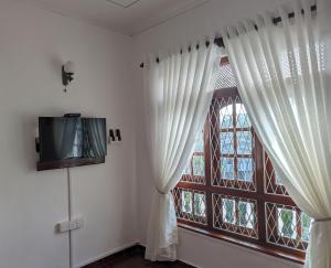 TV a/nebo společenská místnost v ubytování Condo NÖJE