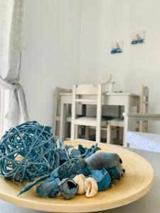 a pile of stuffed animals sitting on a plate at Aegean Aura Apartment II in Kalymnos +14 photos