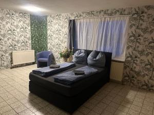 WG Riedau tesisinde bir odada yatak veya yataklar