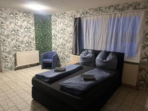 Cama ou camas em um quarto em WG Riedau