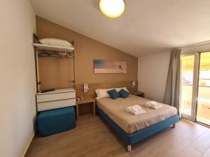 Postel nebo postele na pokoji v ubytování B&B Al Quadrato