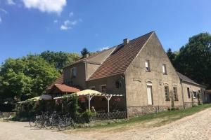 a building with bikes parked in front of it at Fewo im Naturschutzgebiet, mit schönem Blick in Templin