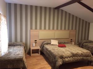 Postel nebo postele na pokoji v ubytování O'Presidente B&B + 11 fotografií