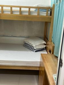 a couple of bunk beds in a room at Johnson Hostel in Hong Kong