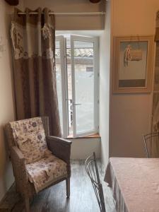 Postel nebo postele na pokoji v ubytování Gîte "Lo Fédou d'Antraigues sur Volane"
