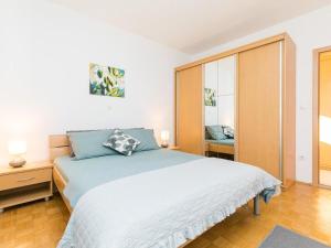 Postel nebo postele na pokoji v ubytování Villa Dijana
