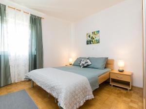 Postel nebo postele na pokoji v ubytování Villa Dijana