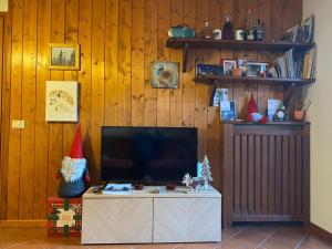 TV a/nebo společenská místnost v ubytování casa Margherita