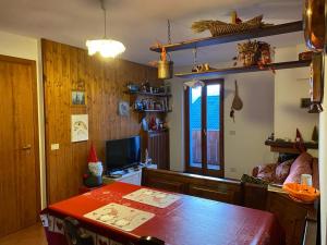TV a/nebo společenská místnost v ubytování casa Margherita