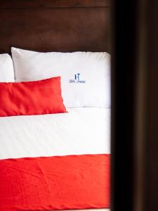 Postel nebo postele na pokoji v ubytování Hotel Imperial