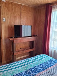 TV a/nebo společenská místnost v ubytování Cabaña ecológica