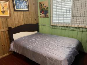 Una cama o camas en una habitación de Casa de Praia 10 fotos más