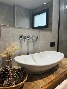 Koupelna v ubytování OCEANO a dos cuadras de la playa + 10 fotografií