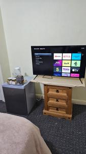 a box on top of a desk in a room at Beautiful 1-Bed House in Leeds in Leeds