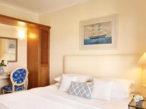 Posteľ alebo postele v izbe v ubytovaní Grecotel Marine Palace & Aqua Park