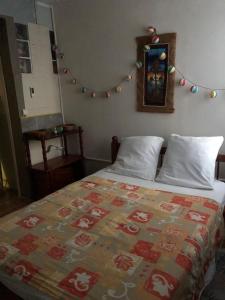 Кровать или кровати в номере Bas de villa ensoleillé ventilé