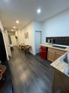 a kitchen with a table and a counter top at Charming Philly Row 2 Units in Philadelphia