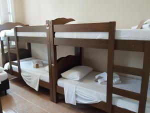 Casa das Luzes Hostel IVN客房内的一张或多张床位