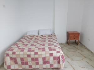 Postel nebo postele na pokoji v ubytování Doña Amalia + 1 fotografie