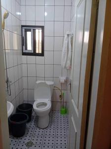 Ett badrum på Tchams Residence
