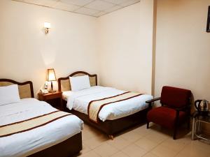 Postel nebo postele na pokoji v ubytování ANH ĐÀO HOTEL