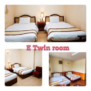 Postel nebo postele na pokoji v ubytování ANH ĐÀO HOTEL