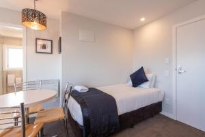 Voodi või voodid majutusasutuse Capital View Motor Inn - Free Parking toas