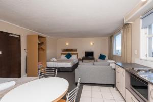 Voodi või voodid majutusasutuse Capital View Motor Inn - Free Parking toas