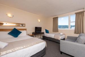 Voodi või voodid majutusasutuse Capital View Motor Inn - Free Parking toas
