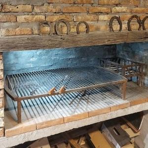 a bed with a bunch of tools on it at El Potrero Casa de Campo in Arana