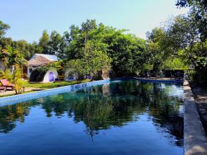 Bazén v ubytování Bohemiaz Resort and Spa Kampot nebo v jeho okolí
